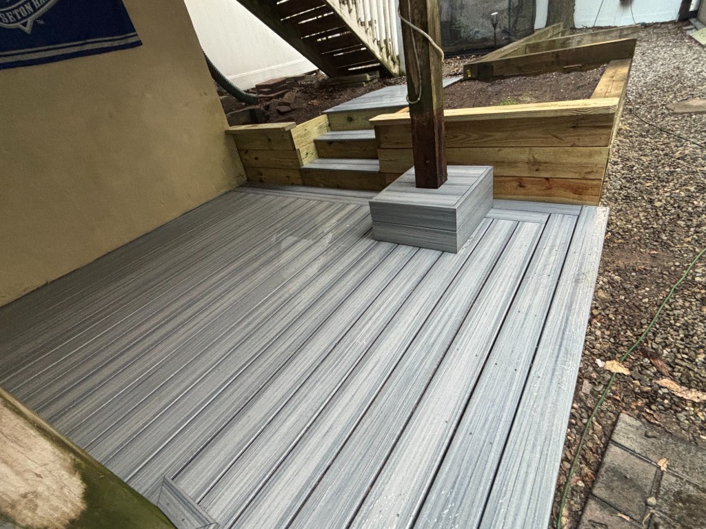 Composite deck stairs with timber planter walls